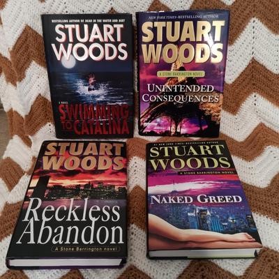 LOT 54: Collection of Stuart Wood and Sharon Kay Penman Hardback Novels with a Large Crocheted Throw Blanket