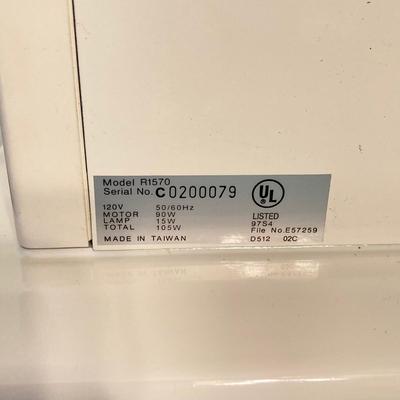 LOT 65: RICCAR Model R-1570 Sewing Machine with Large Collection of New Look Sewing Patterns and More