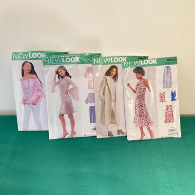 LOT 65: RICCAR Model R-1570 Sewing Machine with Large Collection of New Look Sewing Patterns and More