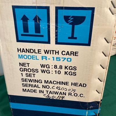 LOT 65: RICCAR Model R-1570 Sewing Machine with Large Collection of New Look Sewing Patterns and More