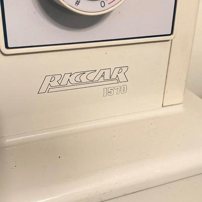 LOT 65: RICCAR Model R-1570 Sewing Machine with Large Collection of New Look Sewing Patterns and More