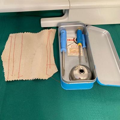 LOT 65: RICCAR Model R-1570 Sewing Machine with Large Collection of New Look Sewing Patterns and More