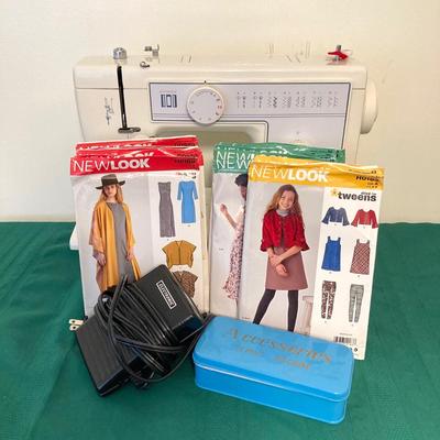 LOT 65: RICCAR Model R-1570 Sewing Machine with Large Collection of New Look Sewing Patterns and More