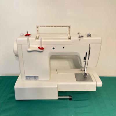 LOT 65: RICCAR Model R-1570 Sewing Machine with Large Collection of New Look Sewing Patterns and More