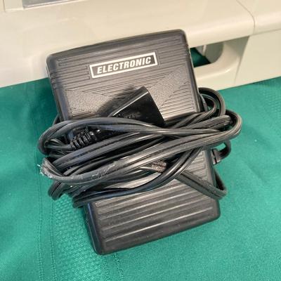 LOT 65: RICCAR Model R-1570 Sewing Machine with Large Collection of New Look Sewing Patterns and More