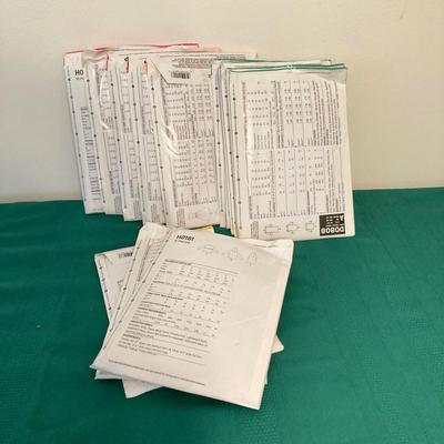 LOT 65: RICCAR Model R-1570 Sewing Machine with Large Collection of New Look Sewing Patterns and More