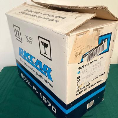 LOT 65: RICCAR Model R-1570 Sewing Machine with Large Collection of New Look Sewing Patterns and More