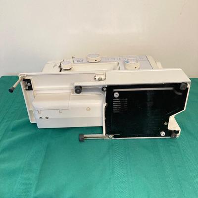 LOT 65: RICCAR Model R-1570 Sewing Machine with Large Collection of New Look Sewing Patterns and More