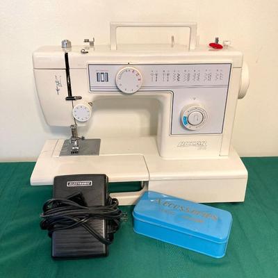 LOT 65: RICCAR Model R-1570 Sewing Machine with Large Collection of New Look Sewing Patterns and More
