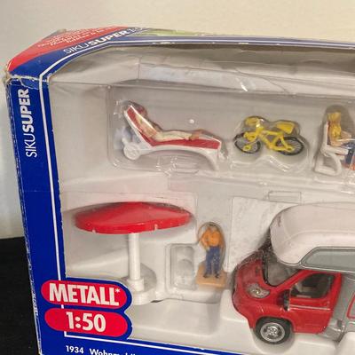 LOT 72: Vintage Motorific Race Rally Carrying Case and Siku 1934 Wohnmobil Hymer Caravan / Camping Car in Original Package