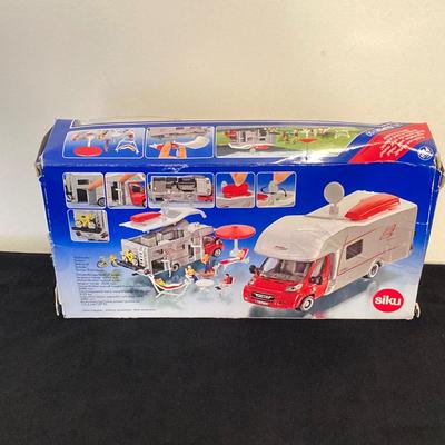 LOT 72: Vintage Motorific Race Rally Carrying Case and Siku 1934 Wohnmobil Hymer Caravan / Camping Car in Original Package