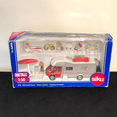 LOT 72: Vintage Motorific Race Rally Carrying Case and Siku 1934 Wohnmobil Hymer Caravan / Camping Car in Original Package