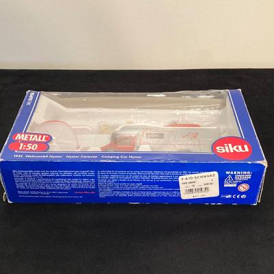 LOT 72: Vintage Motorific Race Rally Carrying Case and Siku 1934 Wohnmobil Hymer Caravan / Camping Car in Original Package
