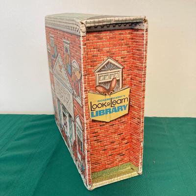 LOT 77: Richard Scarry's Look and Learn Library Book Set and J. Chein & Co. Made in U.S.A. Toy Tin Top