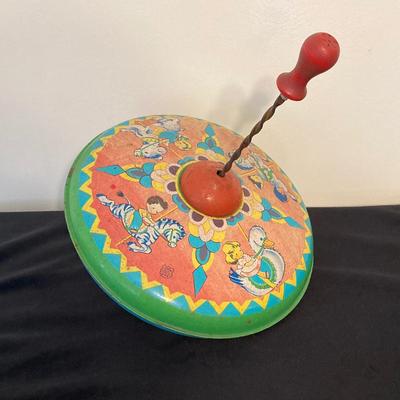 LOT 77: Richard Scarry's Look and Learn Library Book Set and J. Chein & Co. Made in U.S.A. Toy Tin Top