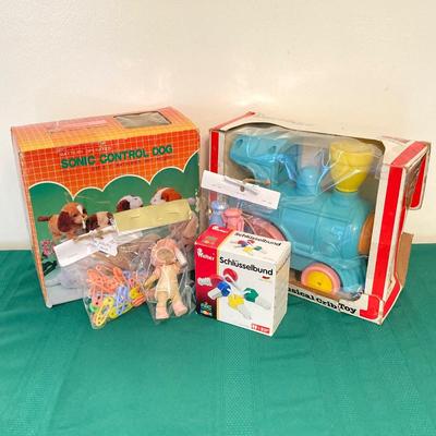 LOT 78: Sonic Control Dog in Original Box, Mattel Preschool Rail Runner, Walter Schlusselbund Key Chain with Miniature Cabbage Patch...