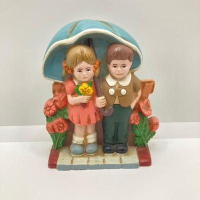 LOT 80: Vintage 1993 W.A. Cast Iron Boy and Girl Under Umbrella with Flowers (Made in China)