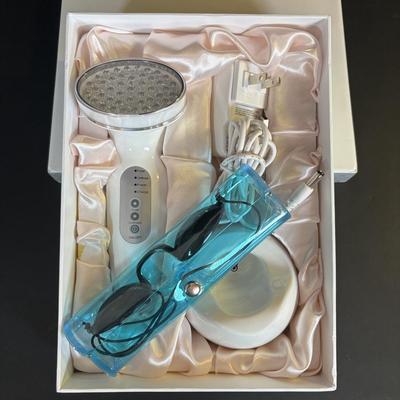 LOT 84: NIP Teak Tub Caddy, Skincare Options PHF-PH-1 Beaty Treatment/Light & What a Relief Infrared Heat Massager