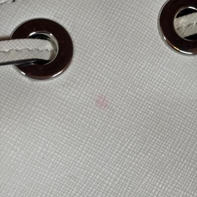LOT 93: Michael Kors White Leather Dottie medium Bucker Bag