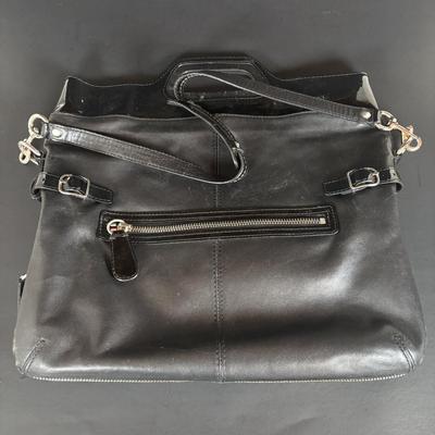 LOT 94: Coach Leather Fold-over Tote Shoulder Bag Model M0873-13380 along with a Coach Lather Zip Accordion Wallet