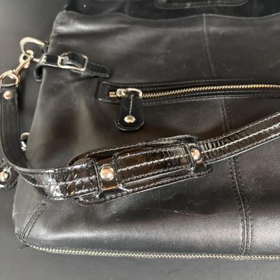 LOT 94: Coach Leather Fold-over Tote Shoulder Bag Model M0873-13380 along with a Coach Lather Zip Accordion Wallet