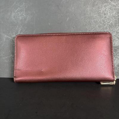 LOT 94: Coach Leather Fold-over Tote Shoulder Bag Model M0873-13380 along with a Coach Lather Zip Accordion Wallet