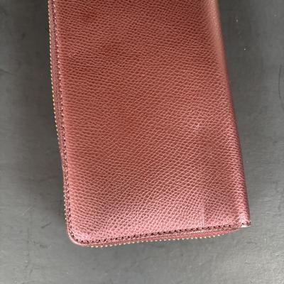 LOT 94: Coach Leather Fold-over Tote Shoulder Bag Model M0873-13380 along with a Coach Lather Zip Accordion Wallet