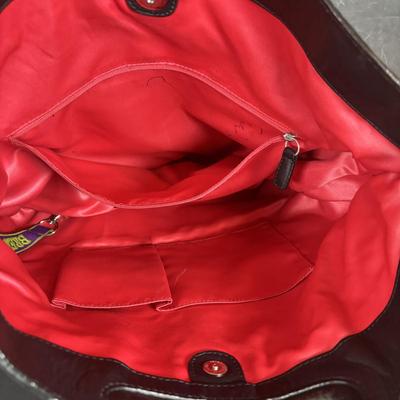 LOT 94: Coach Leather Fold-over Tote Shoulder Bag Model M0873-13380 along with a Coach Lather Zip Accordion Wallet