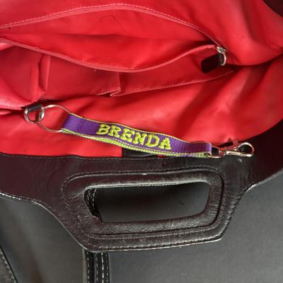 LOT 94: Coach Leather Fold-over Tote Shoulder Bag Model M0873-13380 along with a Coach Lather Zip Accordion Wallet