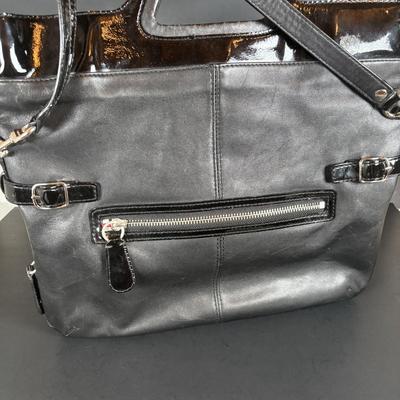 LOT 94: Coach Leather Fold-over Tote Shoulder Bag Model M0873-13380 along with a Coach Lather Zip Accordion Wallet