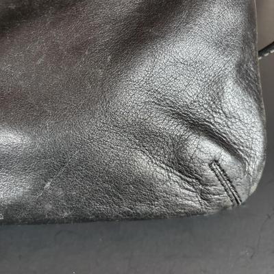 LOT 94: Coach Leather Fold-over Tote Shoulder Bag Model M0873-13380 along with a Coach Lather Zip Accordion Wallet