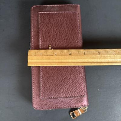 LOT 94: Coach Leather Fold-over Tote Shoulder Bag Model M0873-13380 along with a Coach Lather Zip Accordion Wallet