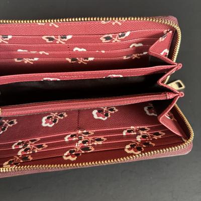 LOT 94: Coach Leather Fold-over Tote Shoulder Bag Model M0873-13380 along with a Coach Lather Zip Accordion Wallet