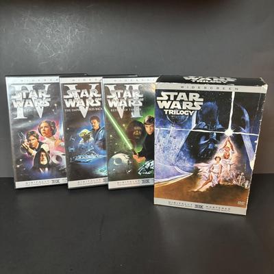 LOT 97: Star Wars: Golden Books Coloring Books, Stars Wars Trilogy DVD Set, Time Magazines along with Lord of the Ring Lego Xbox 360 Game...