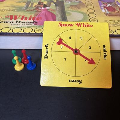 LOT 104: Vintage Disney Golden Star Books & Cadaco Storybook Classic Snow-White Game, Talking View-Master Rudolph the Red-Nosed...