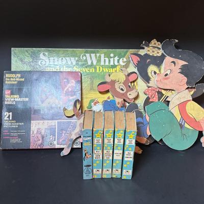 LOT 104: Vintage Disney Golden Star Books & Cadaco Storybook Classic Snow-White Game, Talking View-Master Rudolph the Red-Nosed...
