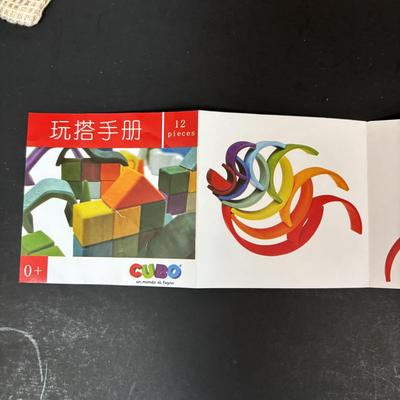 LOT 107: Hooked on Phonics K-1st Grade & Cubo Wooden Rainbow Toy