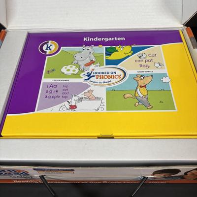 LOT 107: Hooked on Phonics K-1st Grade & Cubo Wooden Rainbow Toy