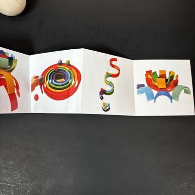 LOT 107: Hooked on Phonics K-1st Grade & Cubo Wooden Rainbow Toy