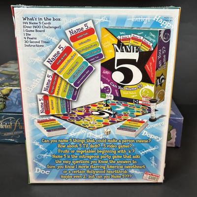 LOT 109: NIP Boad Games: Monty Python & the Holy Grail Python-Opoly, Name 5, Magnetic Battle Game, Trivia Pursuit & More