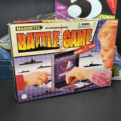 LOT 109: NIP Boad Games: Monty Python & the Holy Grail Python-Opoly, Name 5, Magnetic Battle Game, Trivia Pursuit & More