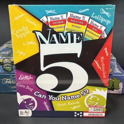 LOT 109: NIP Boad Games: Monty Python & the Holy Grail Python-Opoly, Name 5, Magnetic Battle Game, Trivia Pursuit & More