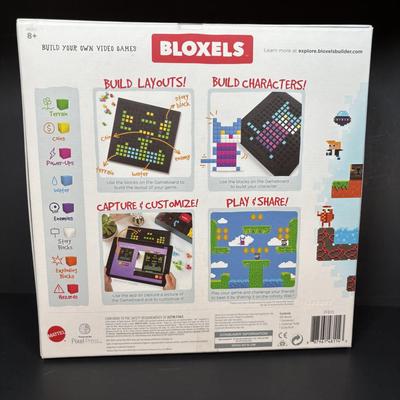LOT 110: DVDs' & Games: Bloxels Build Your Own Video Game, All Creatures Great & Small Complete Collection, Rocky &...