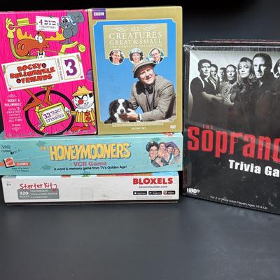 LOT 110: DVDs' & Games: Bloxels Build Your Own Video Game, All Creatures Great & Small Complete Collection, Rocky &...