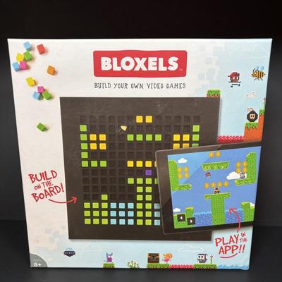 LOT 110: DVDs' & Games: Bloxels Build Your Own Video Game, All Creatures Great & Small Complete Collection, Rocky &...