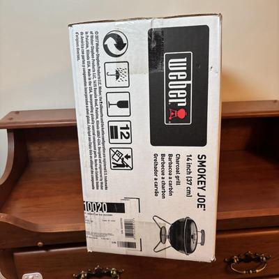 LOT 119: NIB Weber Smokey Joe Grill