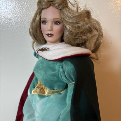 LOT 122: Lenox Christmas Princess Doll, Knowles China Wizard of Oz Collectors Plate and Madame Alexander Dolls