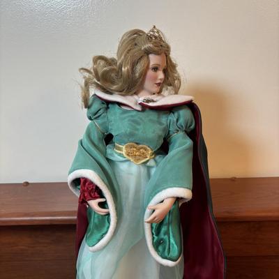 LOT 122: Lenox Christmas Princess Doll, Knowles China Wizard of Oz Collectors Plate and Madame Alexander Dolls