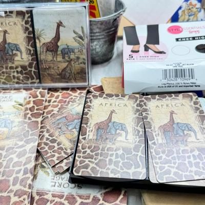 Sale Photo Thumbnail #449: Spiral and other bound notebooks. Africa Giraffe playing cards and score pads. fine paper, postcards autograph book from 1900. "may your memories shire as bright as Edison's light."