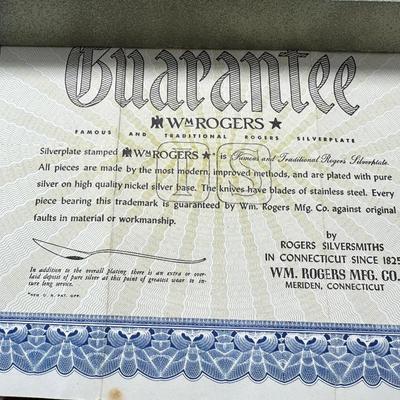 Sale Photo Thumbnail #464: Set for 12 ( 8 knives) with serving pieces in original tarnish proof box with COA. Lovely simple pattern Silver plate Service/6+  50's Mid-Century Modern ROGERS International Flatware SWEEP Pattern SWIRL in Handle w/Leaf Good Condition No Wear